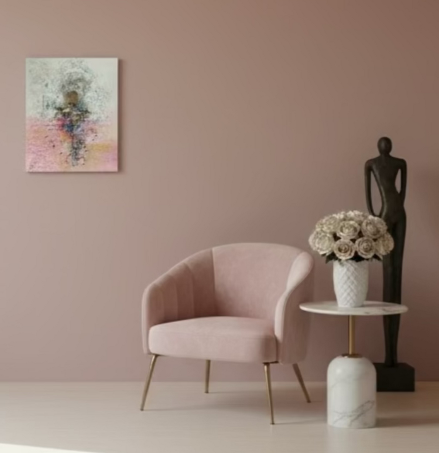 Modern interior with a white wall, chair, and decor items.