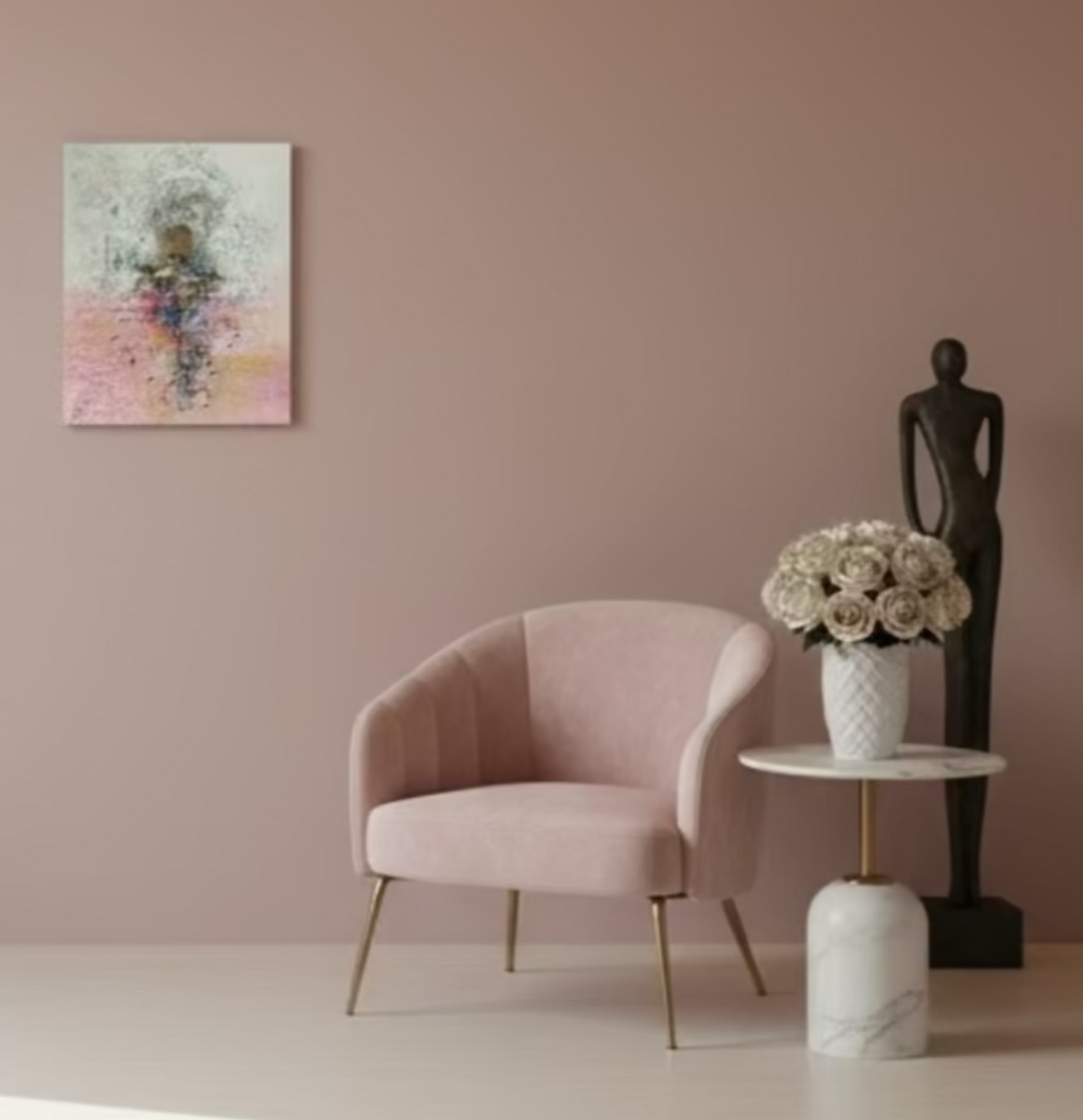 Modern interior with a white wall, chair, and decor items.